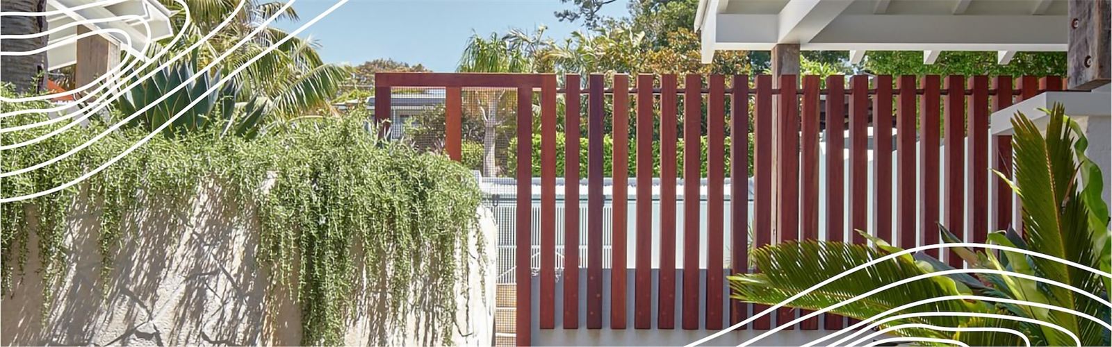 Hardwood batten screen beside a garden