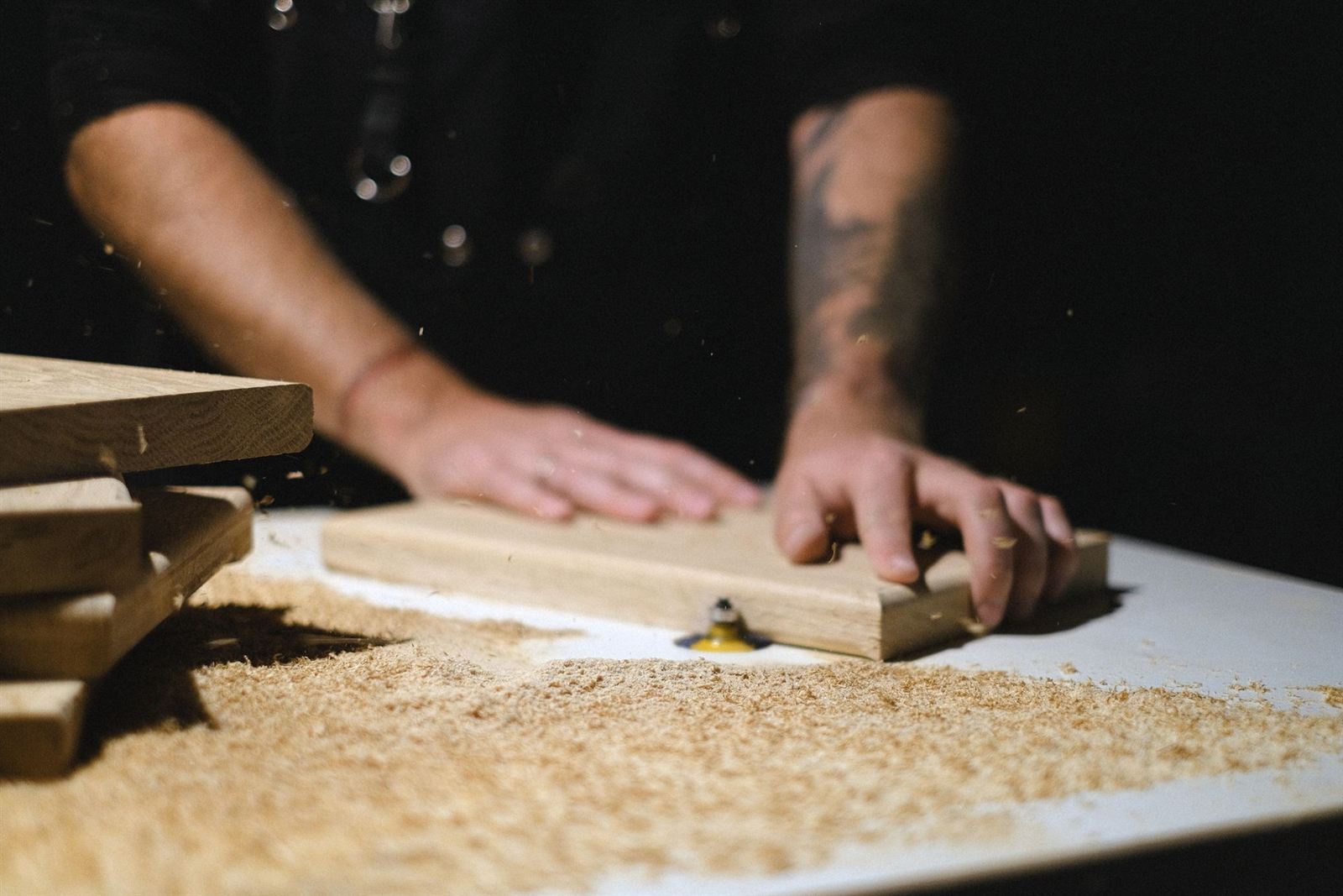 Timber being milled on a router table